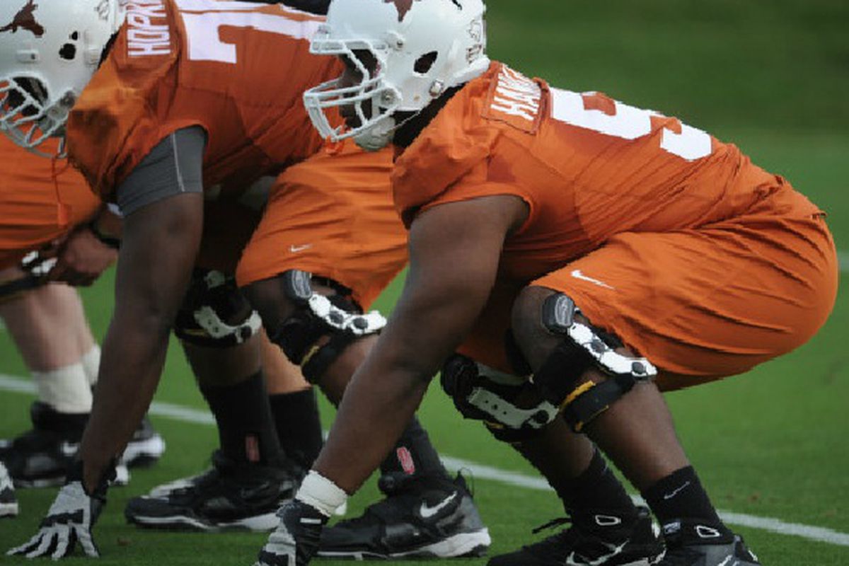 Donald Hawkins showing good alignment on the hoof in Texas opening day spring practice. (TexasSports - Feb. 23, 2012)
