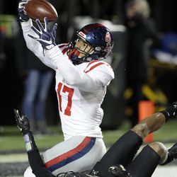 FILE - In this Nov. 19, 2016, file photo, Mississippi tight end Evan Engram (17) catches a 38-yard touchdown pass in the end zone as he is defended by Vanderbilt safety Arnold Tarpley in the second half of an NCAA college football game, in Nashville, Tenn. Engram was selected to the 2016 AP All-America college football team, Monday, Dec. 12, 2016.  