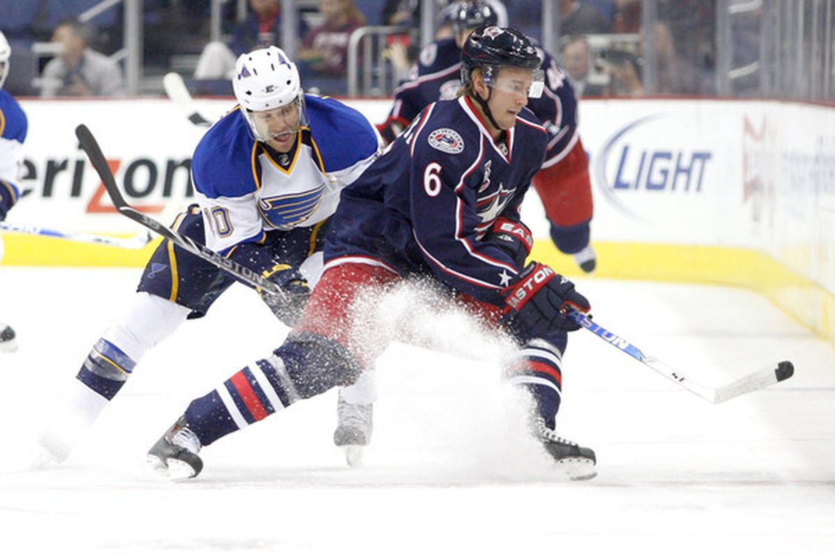 COLUMBUS OH - NOVEMBER 10:  Anton Stralman #6 of the Columbus Blue Jackets and Andy McDonald #10 of the St. Louis Blues battle for control of the puck on November 10 2010 at Nationwide Arena in Columbus Ohio.  (Photo by John Grieshop/Getty Images)
