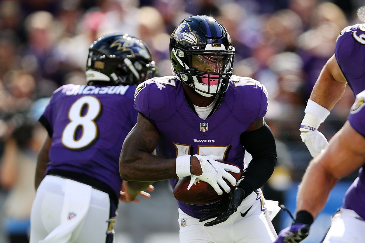 Le’Veon Bell #17 of the Baltimore Ravens runs into the end zone for the touchdown during the second quarter against the Los Angeles Chargers at M&amp;T Bank Stadium on October 17, 2021 in Baltimore, Maryland.
