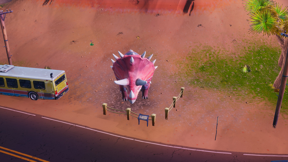 A pink triceratops in the desert section of the Fortnite map