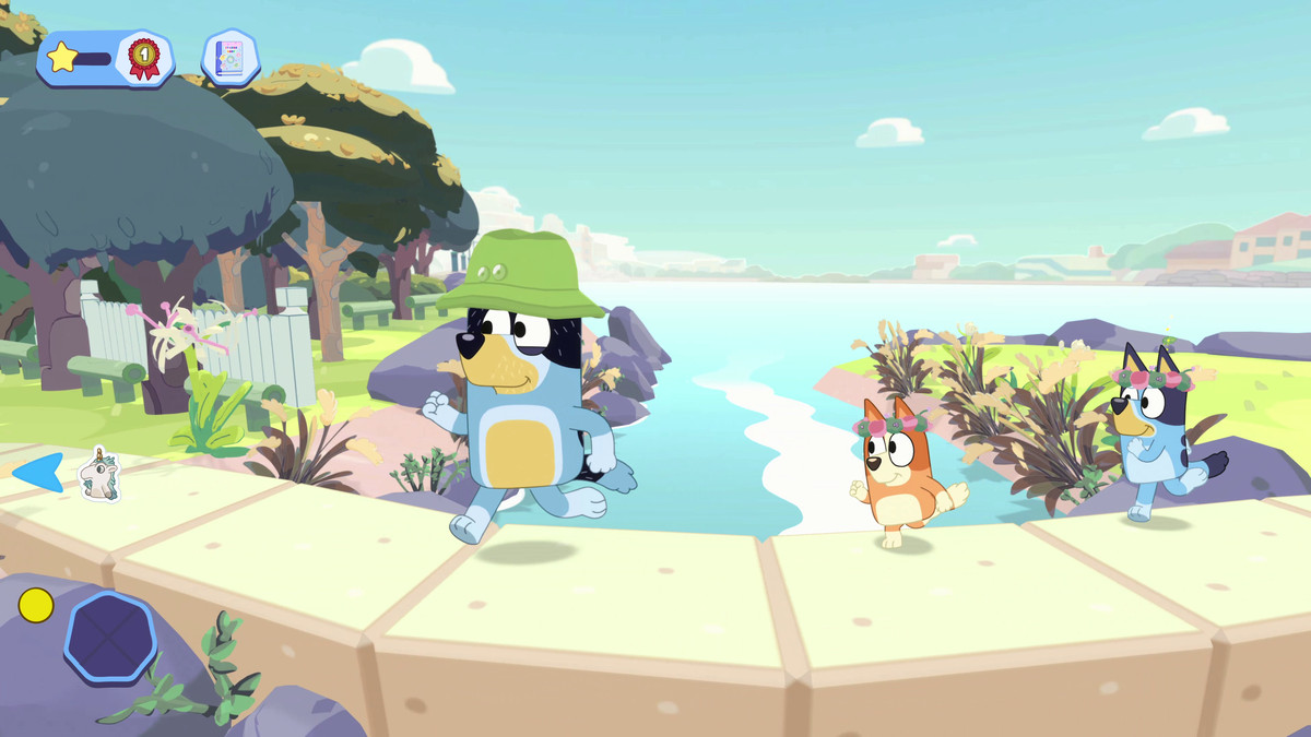 Bluey, Bingo, and Bandit run along the top of a wall with a bright seascape behind them in Bluey: The Videogame