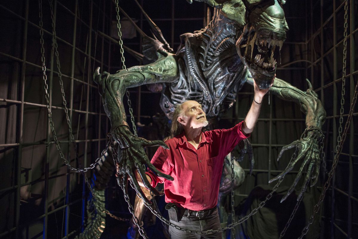 Dan Ohlmann, miniaturist and founder of the “Miniature and Cinema” museum in Lyon, poses with the restored version of the Alien Queen prop from James Cameron’s Aliens