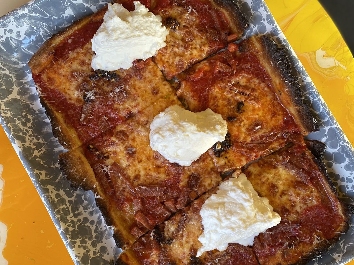 A pepperoni pizza with ricotta fluff from Shuggie’s.
