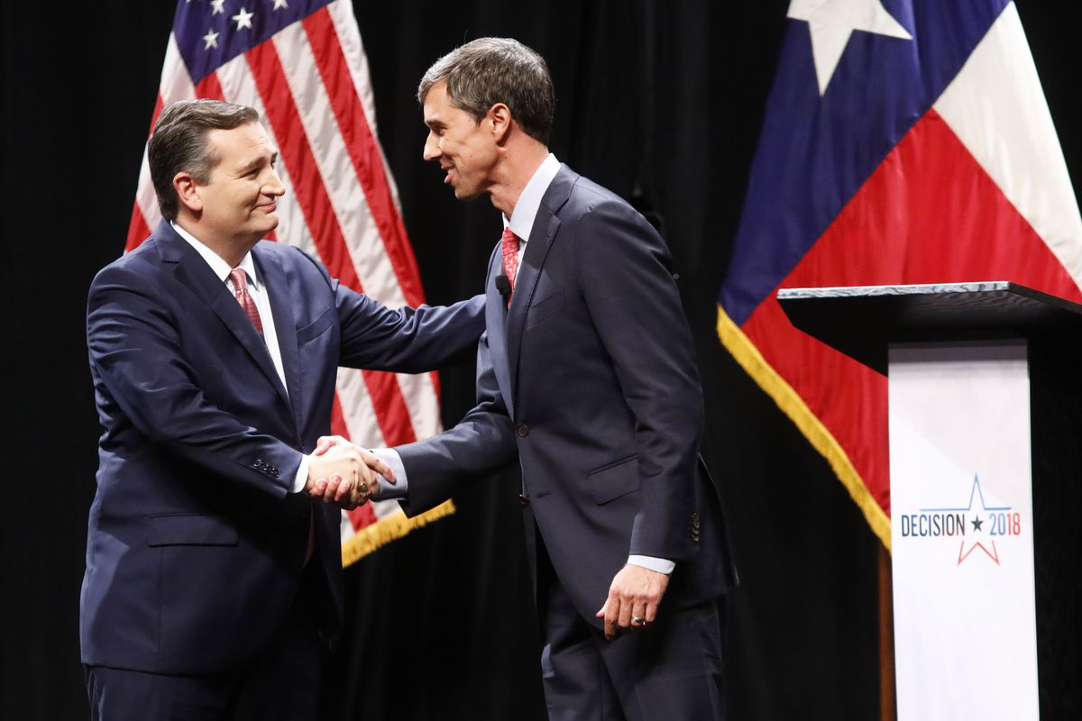 Ted Cruz and Beto O’Rourke shake hands after a debate for Texas’ US Senate seat in September 2018.