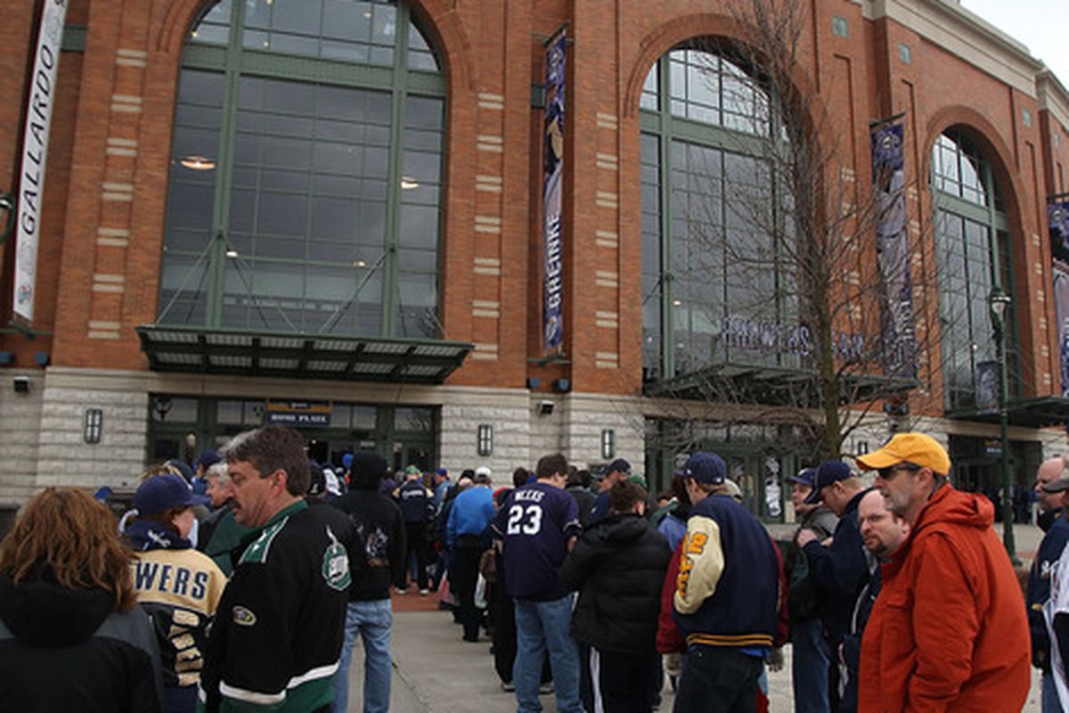 MILWAUKEE, WI - APRIL 04: Fans wait in line to enter Miller Park before the home opener between the Atlanta Braves and the Milwaukee Brewers on April 4, 2011 in Milwaukee, Wisconsin. (Photo by Jonathan Daniel/Getty Images)