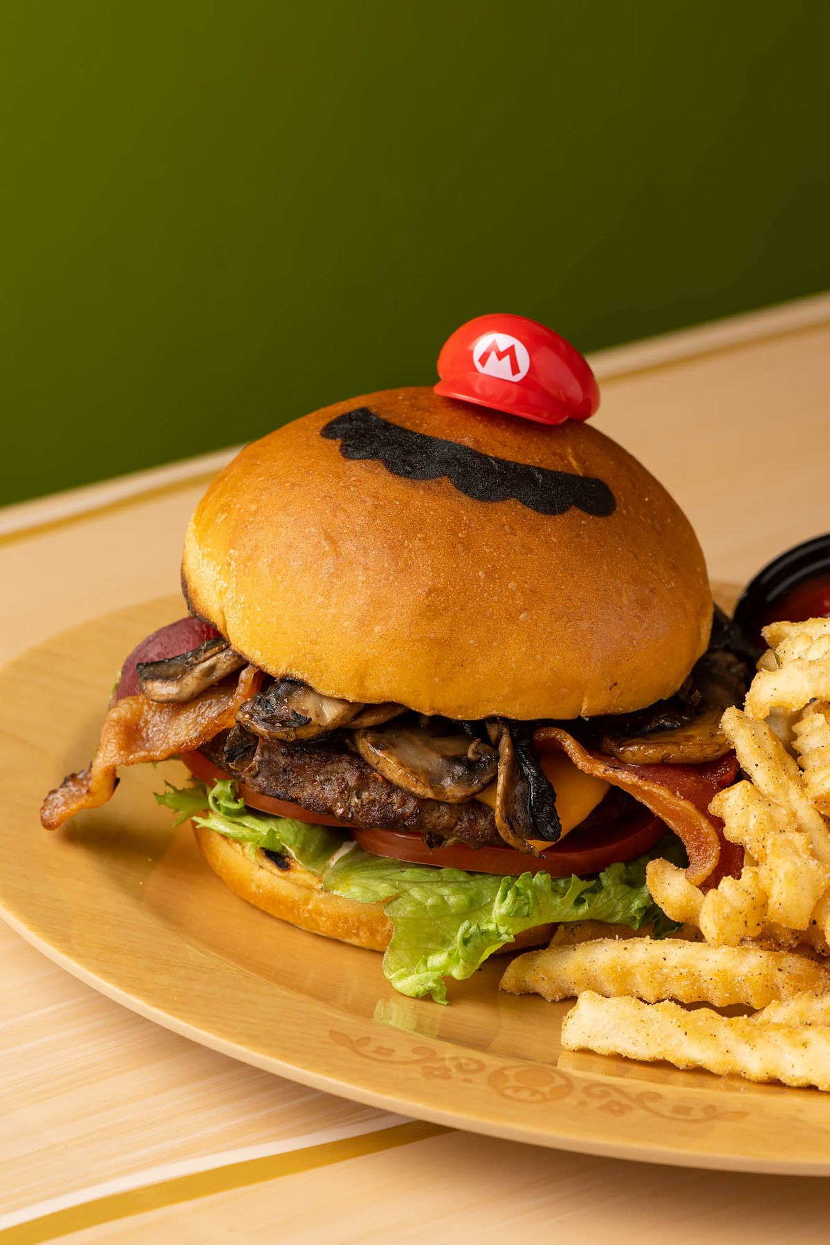 Mario Burger with bacon, mushroom, and cheese.