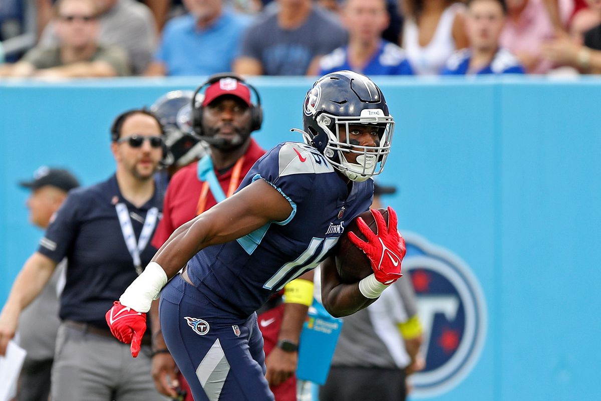NASHVILLE, TENNESSEE - SEPTEMBER 11: Treylon Burks #16 of the Tennessee Titans carries the ball during the game against the New York Giants at Nissan Stadium on September 11, 2022 in Nashville, Tennessee.