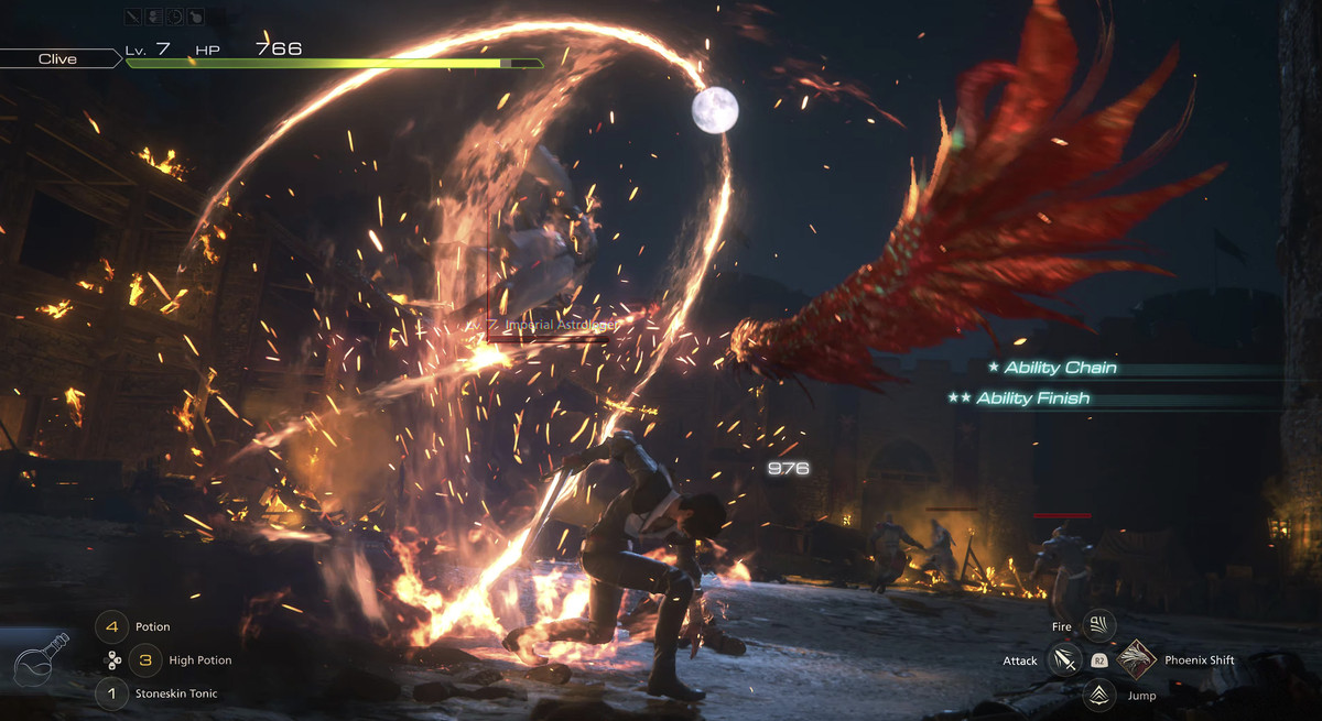 Clive uses a fiery whip-like attack against a winged enemy called an Imperial Astrologer in Final Fantasy 16