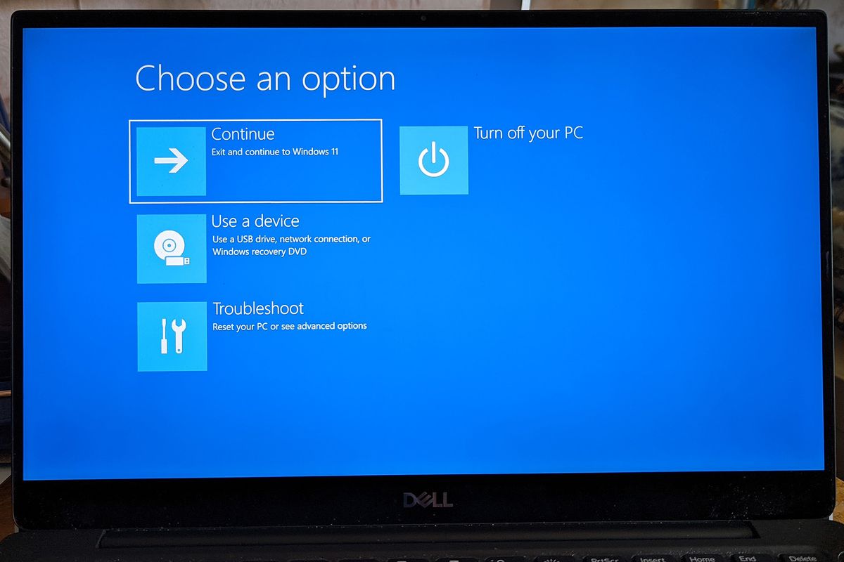 The “Choose an option” screen will lead you to the reset option.