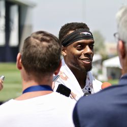 Broncos ILB Brandon Marshall chats with members of the media on the first day of training camp.
