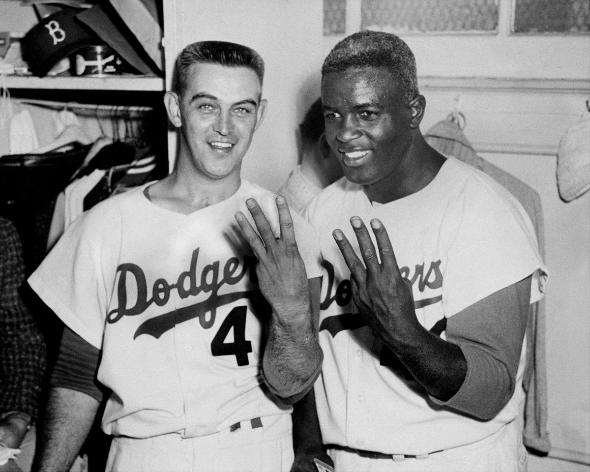 Brooklyn Dodgers’ pitcher Clem Labine and Jackie Robinson in