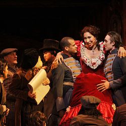 In this photo taken Thursday, Feb. 18, 2010, Nicole Cabell performs as Musetta during a dress rehearsal for La Boheme at the Metropolitan Opera  in New York. (AP Photo/Frank Franklin II)