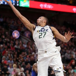 Utah Jazz center Rudy Gobert (27) dunks the ball during a basketball game against the New York Knicks at the Vivint Smart Home Arena in Salt Lake City on Friday, Jan. 19, 2018.
