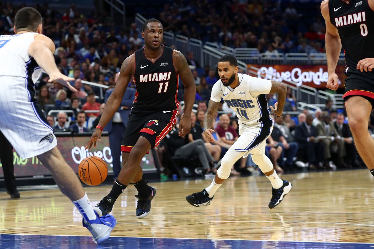 Miami Heat guard Dion Waiters drives to the basket as Orlando Magic guard D.J. Augustin defends during the second quarter at Amway Center.