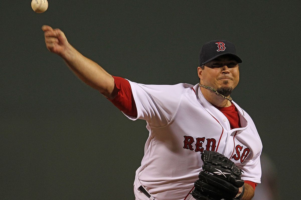 BOSTON, MA - SEPTEMBER 21:  Josh Beckett #19 of the Boston Red Sox throws against the Baltimore Orioles in the 1st inning at Fenway Park September 21, 2011 in Boston, Massachusetts. (Photo by Jim Rogash/Getty Images)