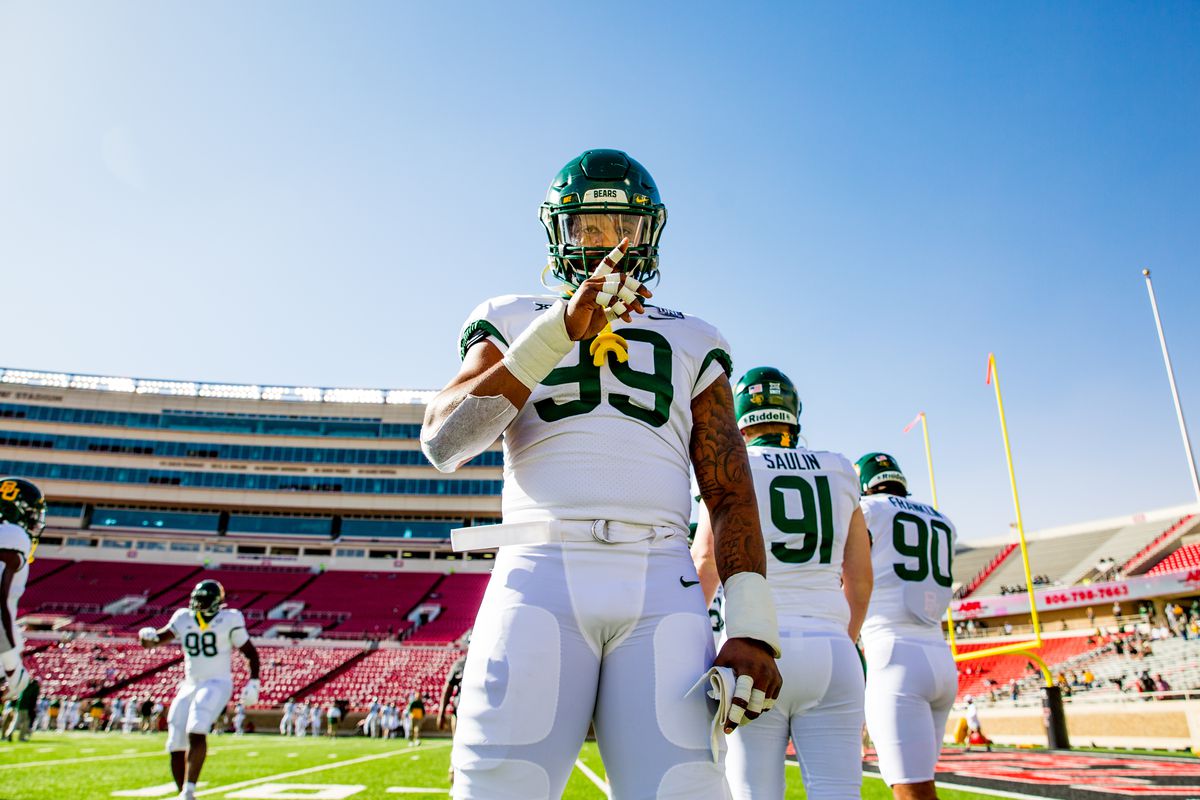 Defensive end William Bradley-King gestures before the college football game against the Baylor Bears at Jones AT&amp;T Stadium on November 14, 2020 in Lubbock, Texas.