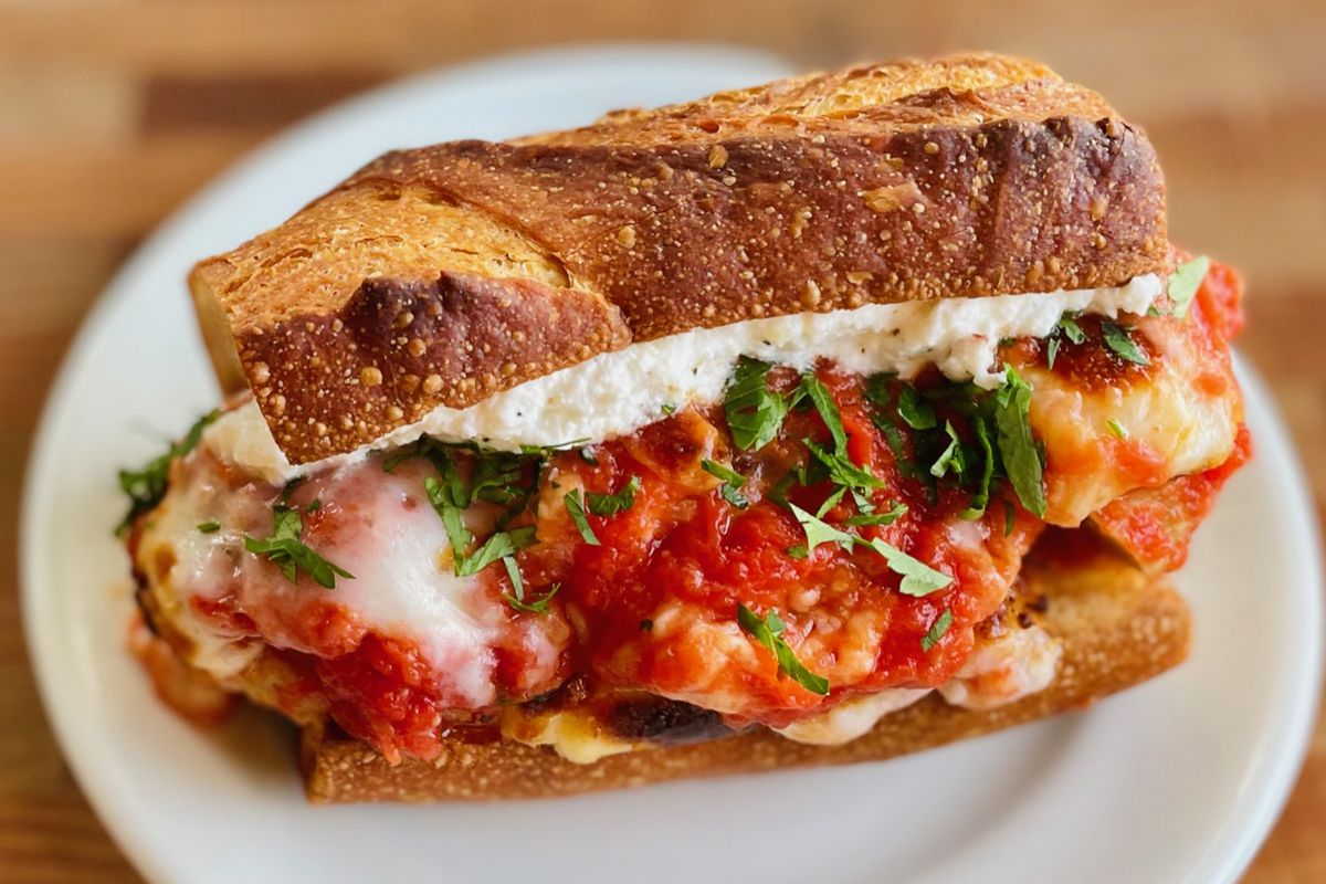A cheesy and tomato-sauce-smothered sandwich from Lucky Horseshoe Lounge.