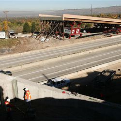View of construction workers along I-215 east near 4500 South  prepping the area for a new bridge to be put in place. A section of I-215 from 3300 South to 6200 South will close today at 8 p.m. and will reopen Monday in time for the morning commute, UDOT says.