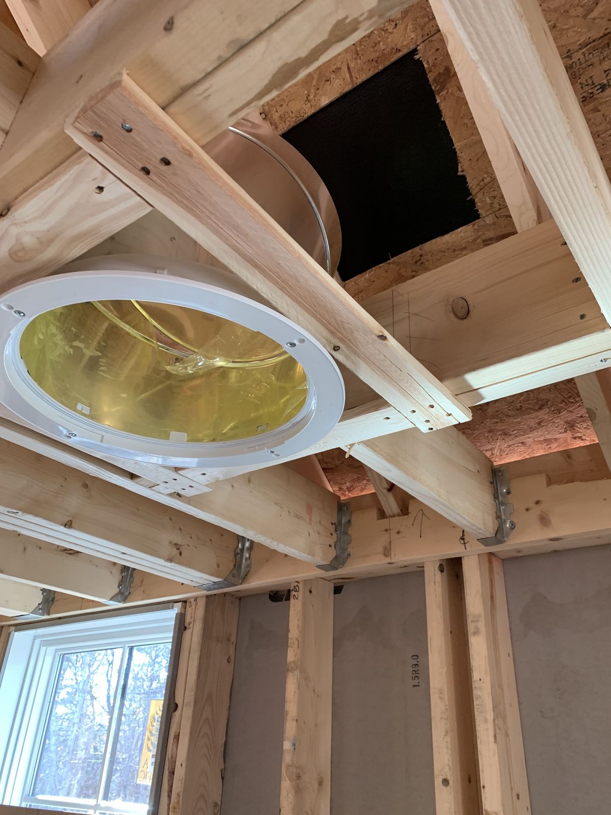 Shot of sun tunnel in ceiling of TOH 2020 Idea House on the Cape