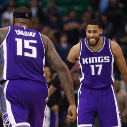 Sacramento Kings forward DeMarcus Cousins (15) celebrates with teammate Sacramento Kings guard Garrett Temple (17) as the Kings go on to defeat the Jazz 94-93 at Vivint Smart Home arena in Salt Lake City on Wednesday, Dec. 21, 2016.