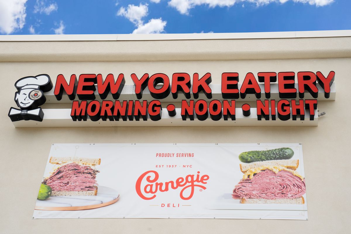 New York Eatery’s sign that reads “Morning- Noon - Night.”