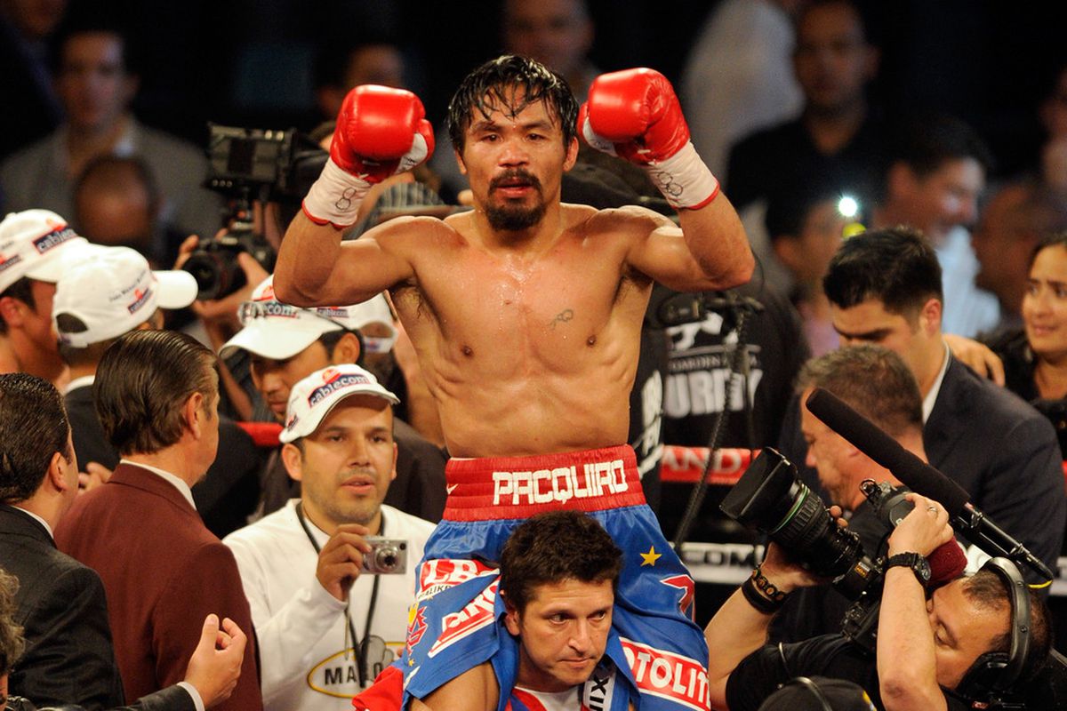Manny Pacquiao celebrated on Saturday, but he wasn't having a good time after the fight. (Photo by Ethan Miller/Getty Images)