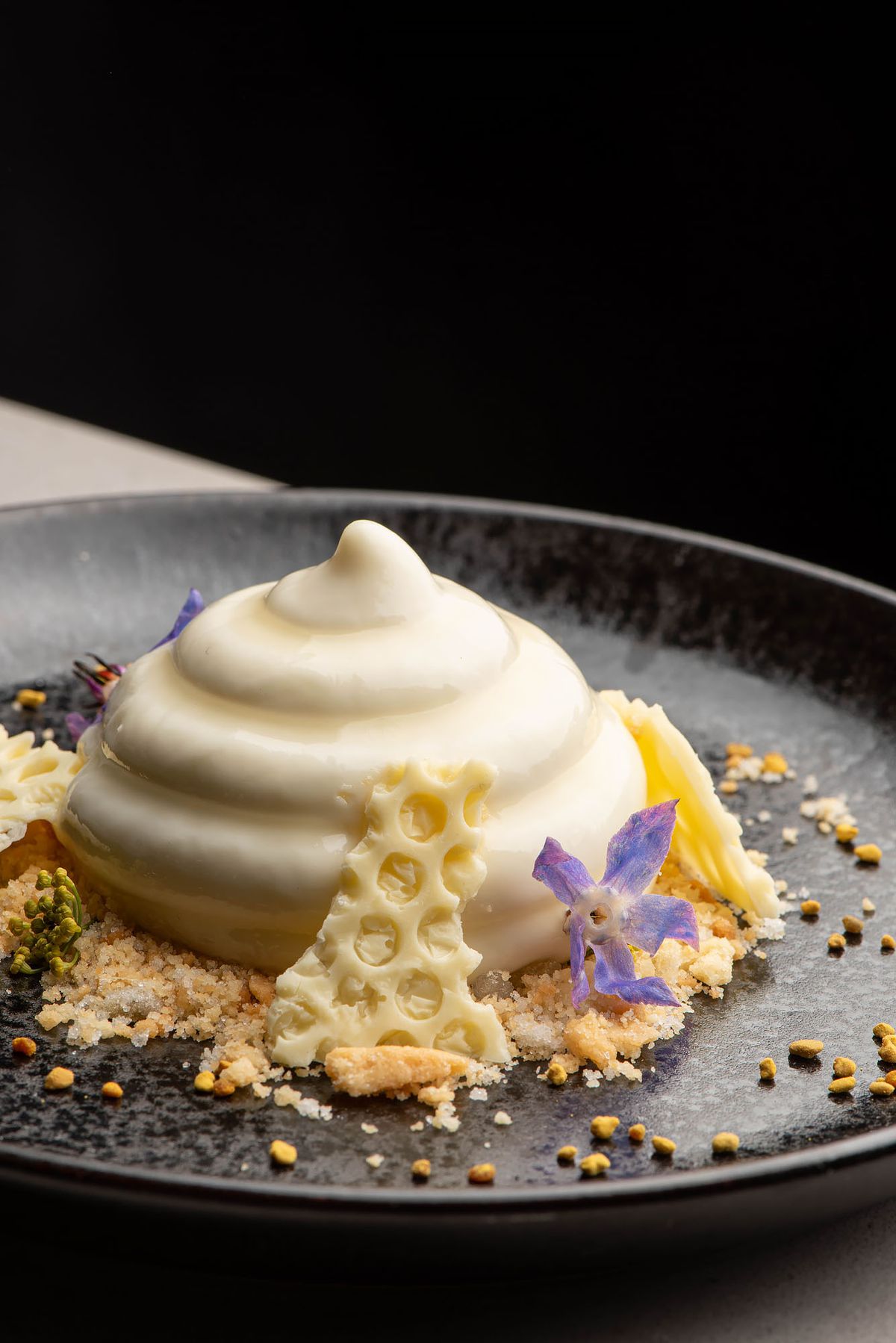 Beehive-shaped panna cotta with white chocolate.