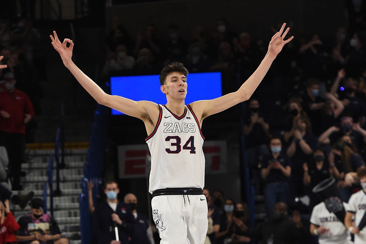Chet Holmgren of the Gonzaga Bulldogs reacts after a three-pointer during the second half of the game against the St. Mary’s Gaels at the McCarthey Athletic Center on February 12, 2022 in Spokane, Washington.