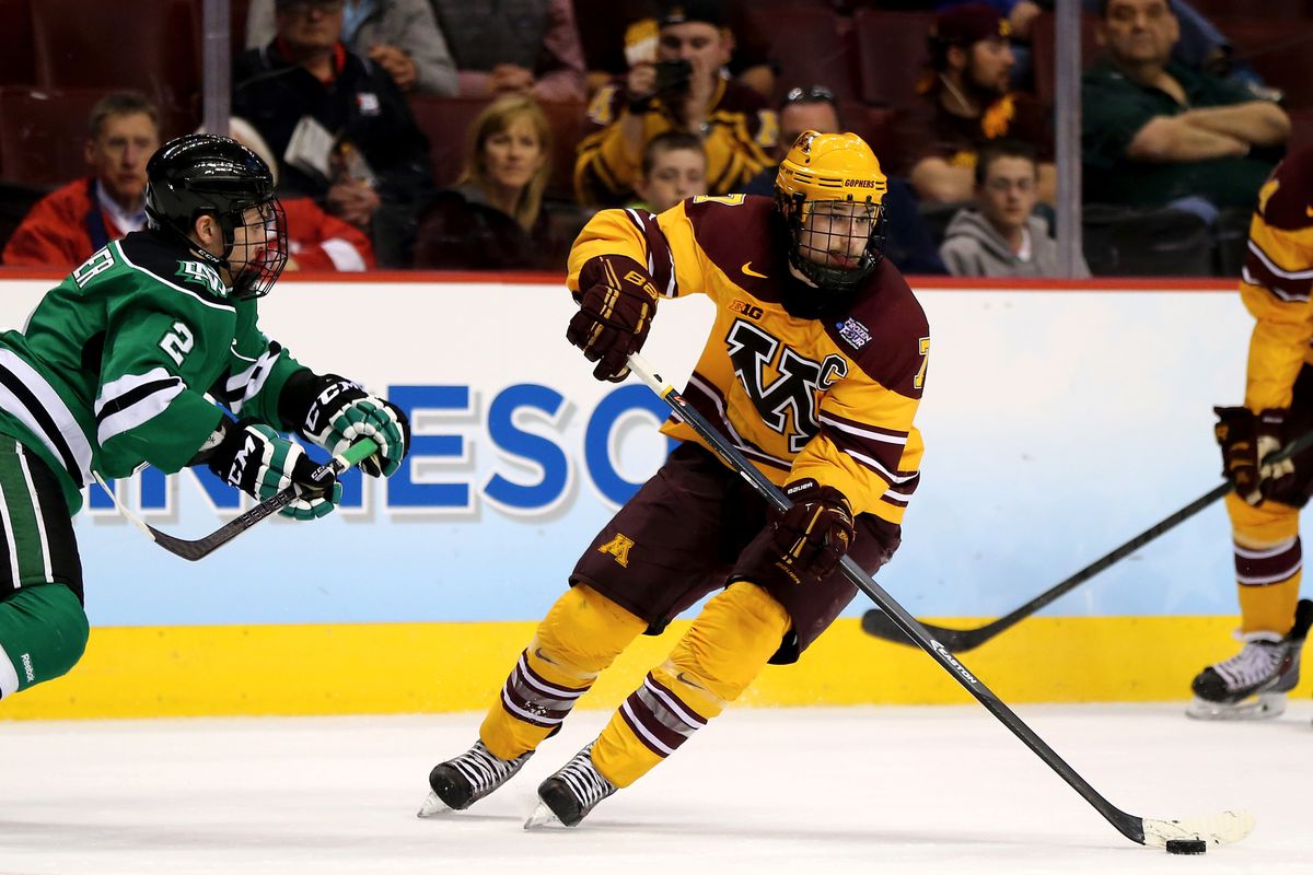 Minnesota Captain Kyle Rau carries the puck during their Frozen Four win over North Dakota