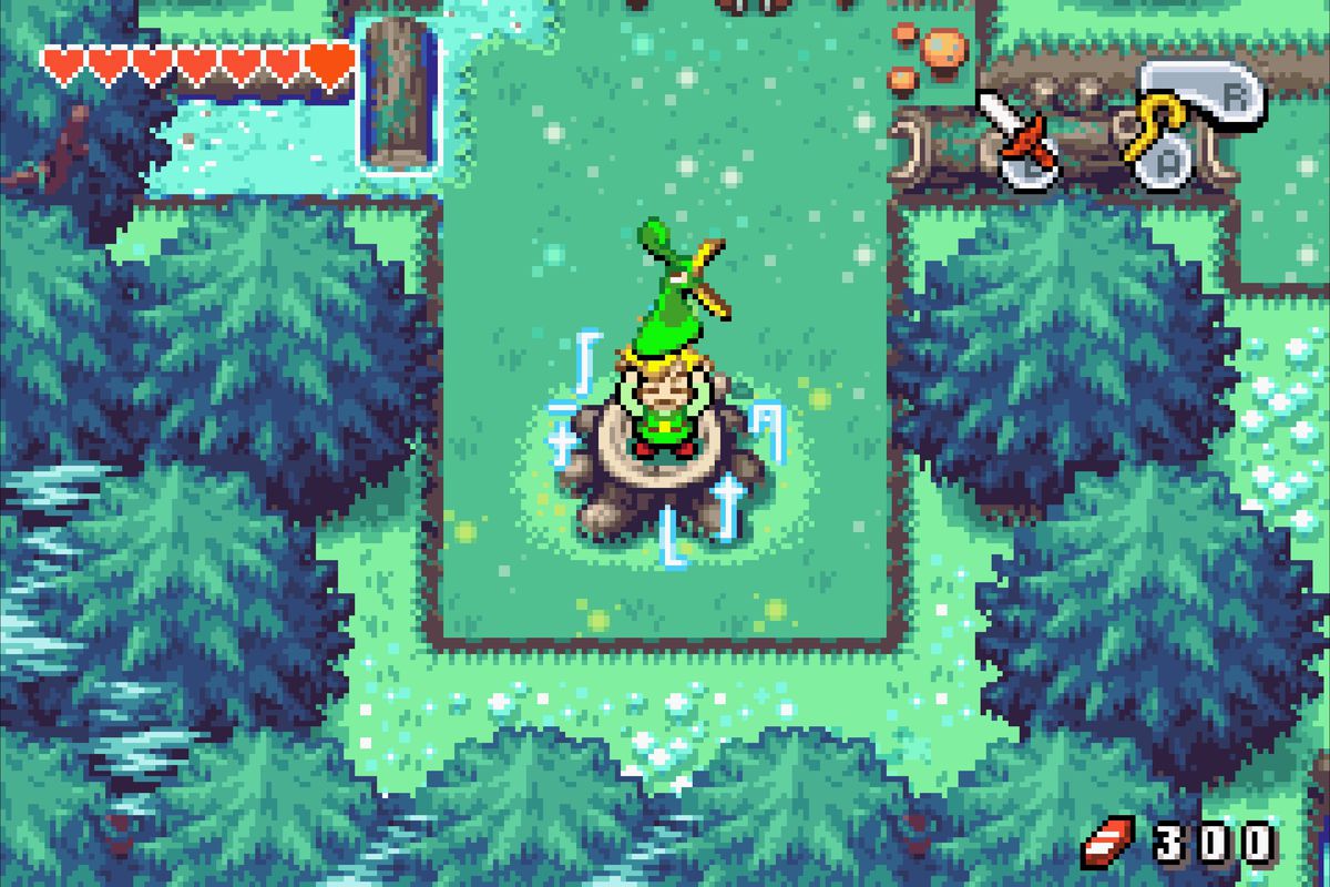 Ezlo sings and Link starts to morph into a “Minish” in a screenshot from The Legend of Zelda: The Minish Cap