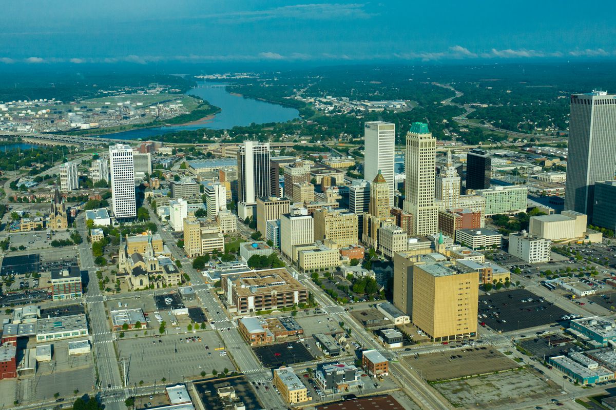 Tulsa Skyline, Oklahoma with Arkansas River in distance as seen from aerial view with drone