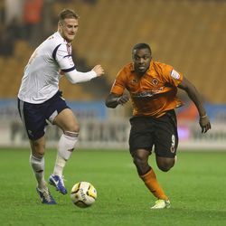 WOLVERHAMPTON, ENGLAND - OCTOBER 23: Sylvan Ebanks-Blake (R) of Wolves moves past Matt Mills during the npower Championship match between Wolverhampton Wanderers and Bolton Wanderers at Molineux on October 23, 2012 in Wolverhampton, England. (Photo by Dav