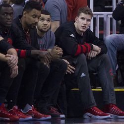 Toronto center Jakob Poeltl (42) watches from the bench as Utah and Toronto battle during an NBA basketball game in Salt Lake City on Friday, Dec. 23, 2016. Toronto took down Utah with a final score of 104-98.