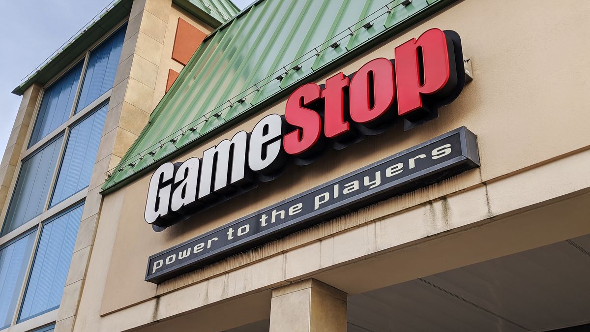 GameStop sign on the front of a strip mall building