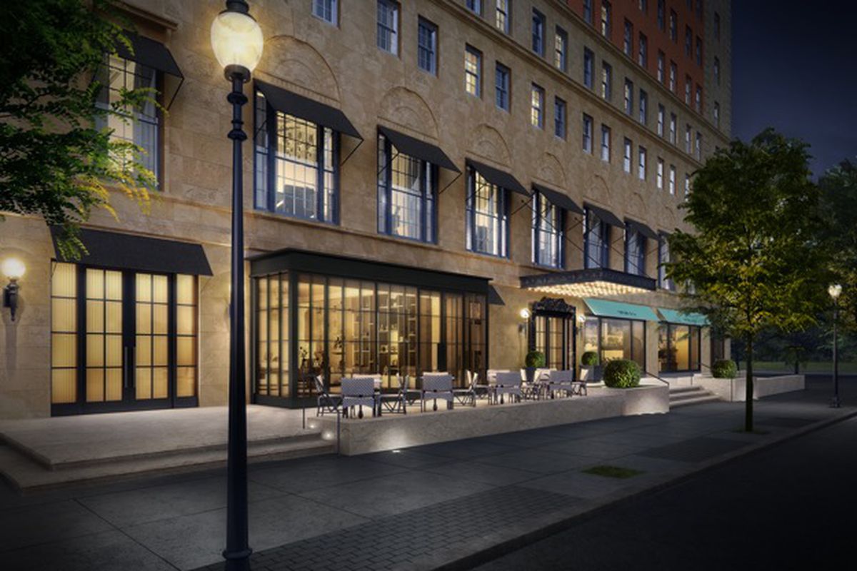 Rendering of the first few floors of a hotel at nighttime as it meets the city sidewalk.