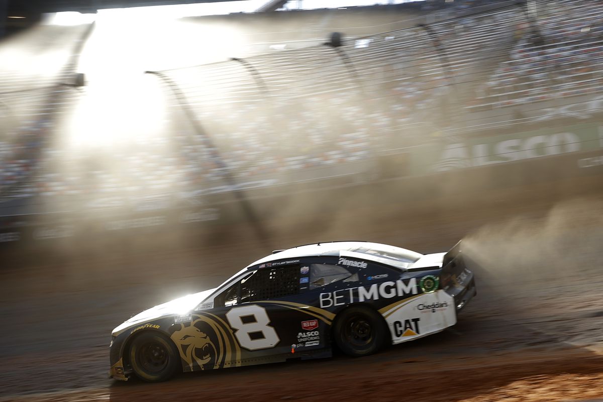 Tyler Reddick, driver of the #8 BetMGM Chevrolet,races during the NASCAR Cup Series Food City Dirt Race at Bristol Motor Speedway on March 29, 2021 in Bristol, Tennessee.
