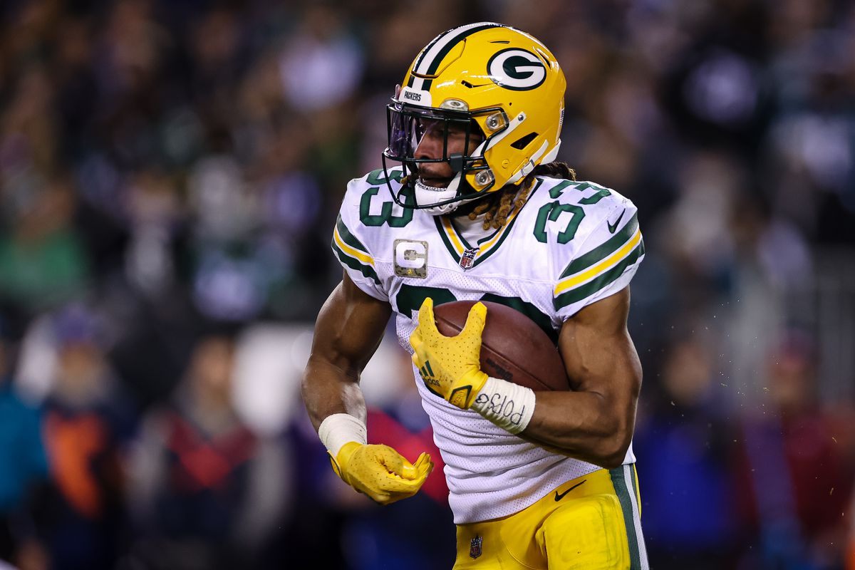 Aaron Jones of the Green Bay Packers carries the ball against the Philadelphia Eagles during the second half at Lincoln Financial Field on November 27, 2022 in Philadelphia, Pennsylvania.