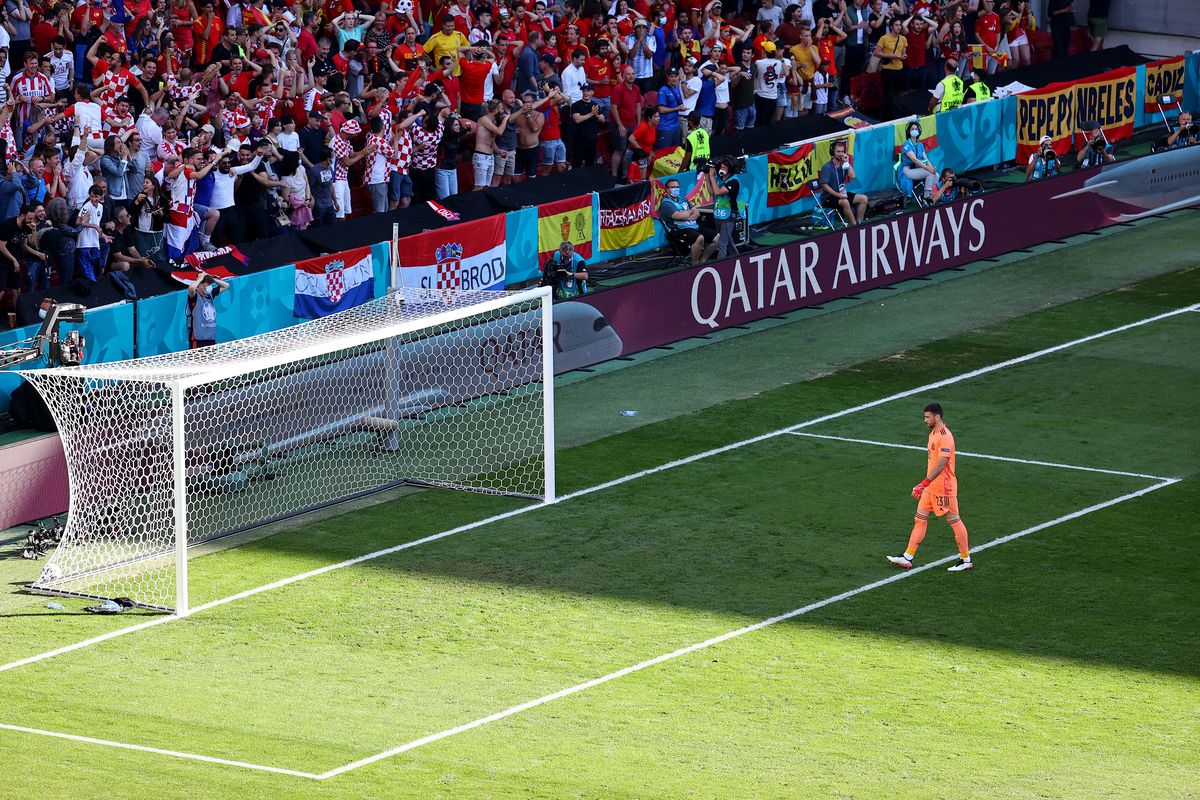 Unai Simon of Spain looks dejected after scoring an own goal for the Croatia first goal during the UEFA Euro 2020 Championship Round of 16 match between Croatia and Spain at Parken Stadium on June 28, 2021 in Copenhagen, Denmark.