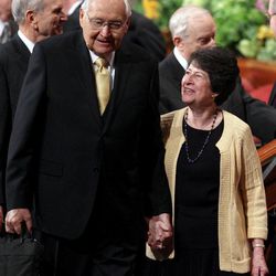 Elder L. Tom Perry and his wife Sister Barbara Perry leave the morning session of the 183rd Annual General Conference of The Church of Jesus Christ of Latter-day Saints in the Conference Center in Salt Lake City on Sunday, April 7, 2013.