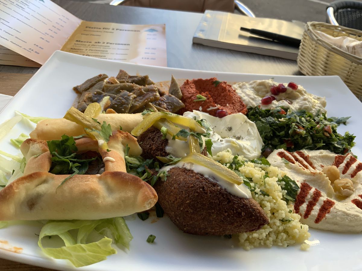 A plate of mixed mezze items. 