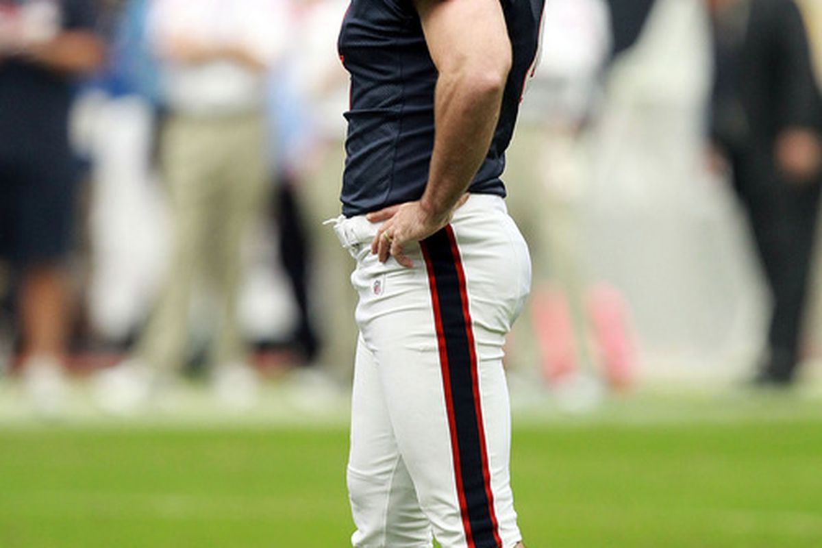 HOUSTON, TX - DECEMBER 18:  Neil Rackers #4 of the Houston Texans reacts after missing a field goal attempt against the Carolina Panthers at Reliant Stadium on December 18, 2011 in Houston, Texas.  (Photo by Ronald Martinez/Getty Images)
