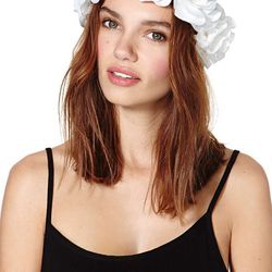 <b>5. Adelina White Flower Crown, <a href="http://www.nastygal.com/accessories-hair-hats/adelina-flower-crown
">$38</a></b> at Nasty Gal. For the bohemian bachelorette, this white floral crown is fresh and fun and you can re-use it for festival season. 
