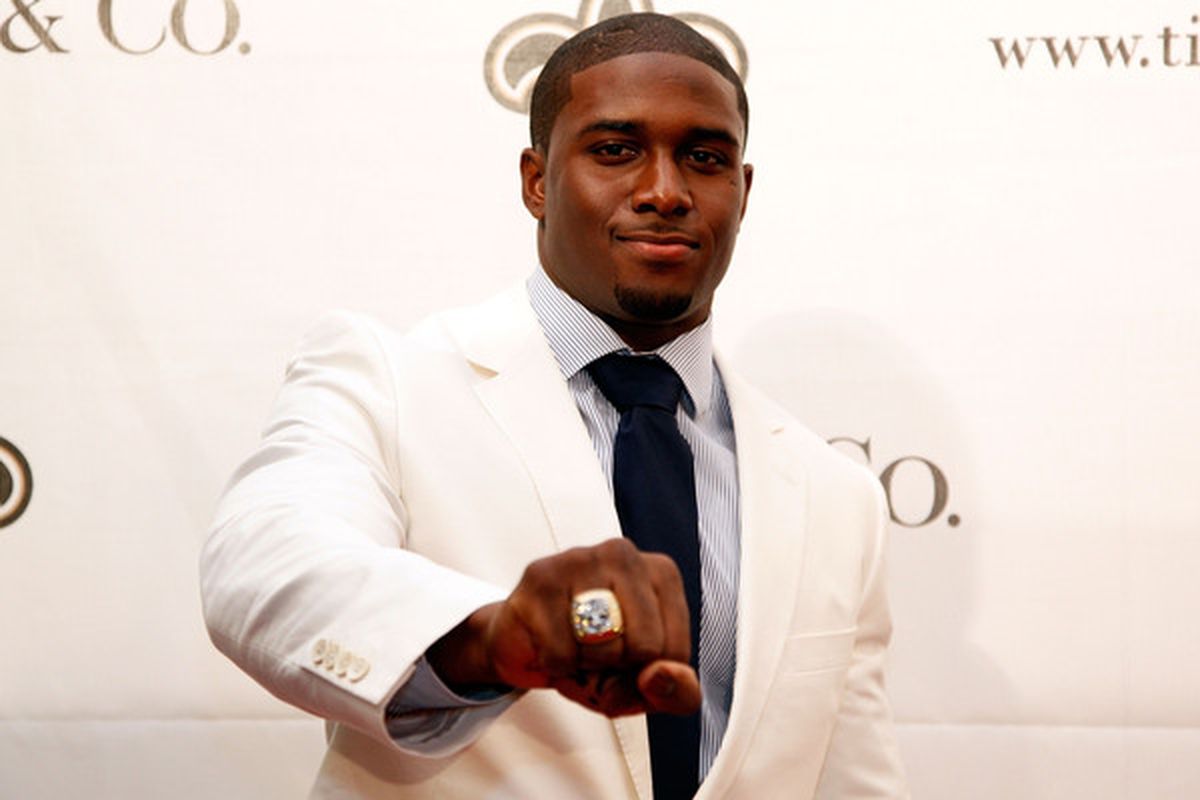NEW ORLEANS - JUNE 16:  Reggie Bush of the New Orleans Saints shows off his ring from Super Bowl XLIV on June 16, 2010 in New Orleans, Louisiana.  (Photo by Chris Graythen/Getty Images)