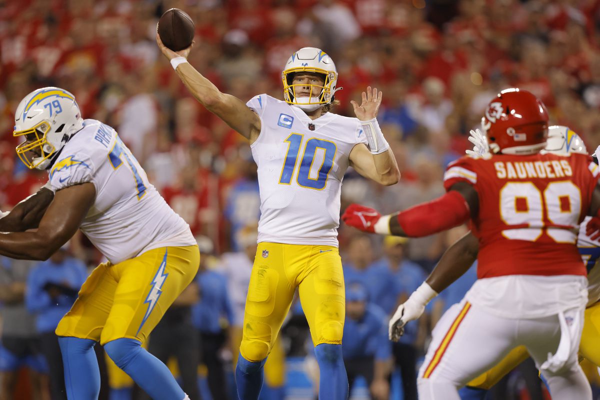 Justin Herbert #10 of the Los Angeles Chargers throws the ball during the third quarter against the Kansas City Chiefs at Arrowhead Stadium on September 15, 2022 in Kansas City, Missouri.
