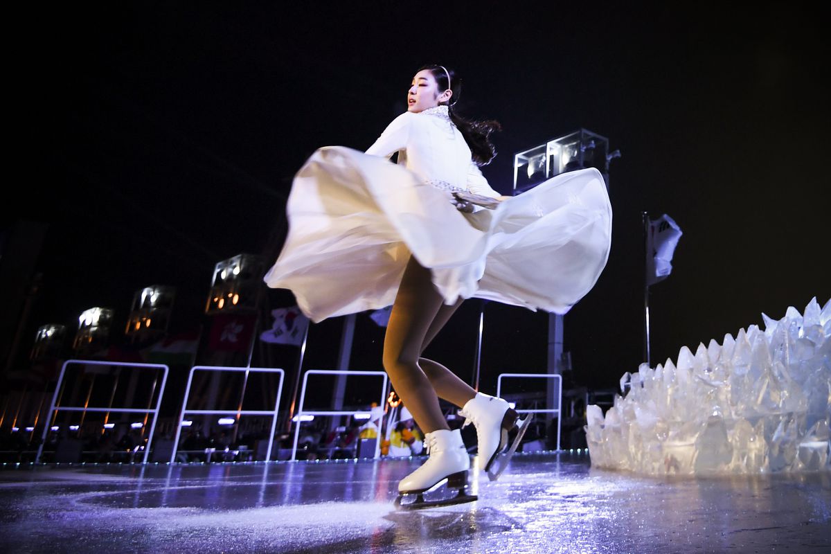 South Korean figure skater Kim Yu-na performs during the opening ceremony of the Pyeongchang 2018 Winter Olympic Games at the Pyeongchang Stadium on February 9, 2018. 