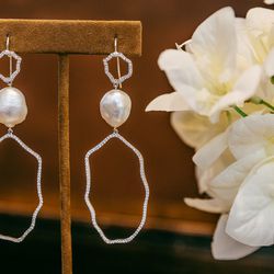<b>Julia Shlovsky</b> diamond and pearl earrings, $6,450. 