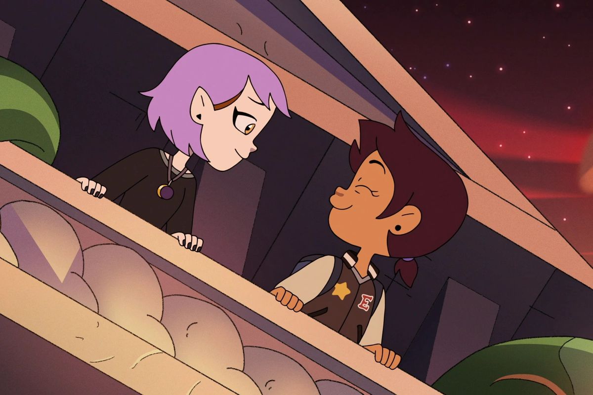 a purple haired girl and a brown haired girl lean over a balcony bathed in rosy sunlight