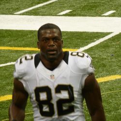 Ben Watson comes over to our section after the game. His wife and mother sit directly in front of me. 