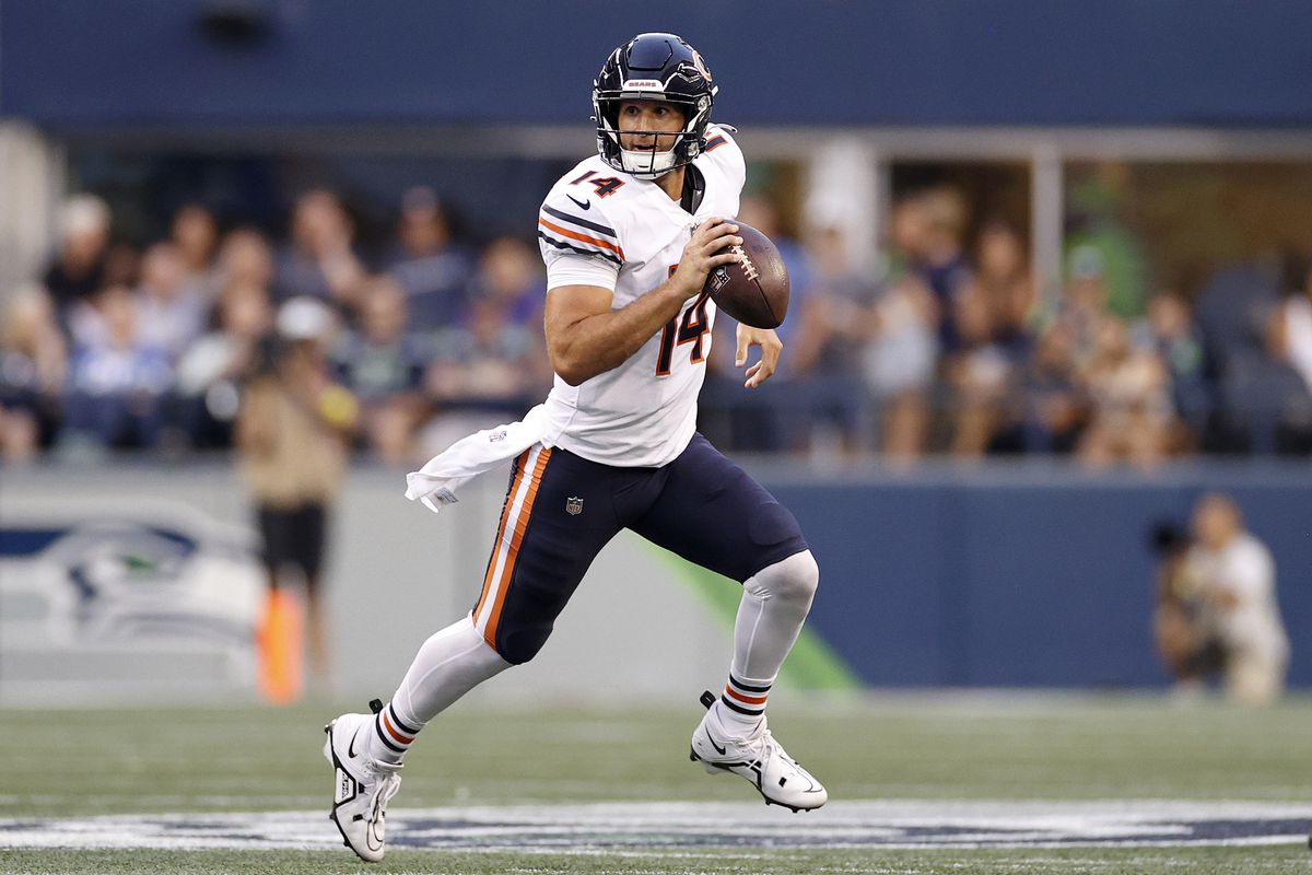 Nathan Peterman #14 of the Chicago Bears looks to pass in the second half during the preseason game between the Seattle Seahawks and the Chicago Bears at Lumen Field on August 18, 2022 in Seattle, Washington.